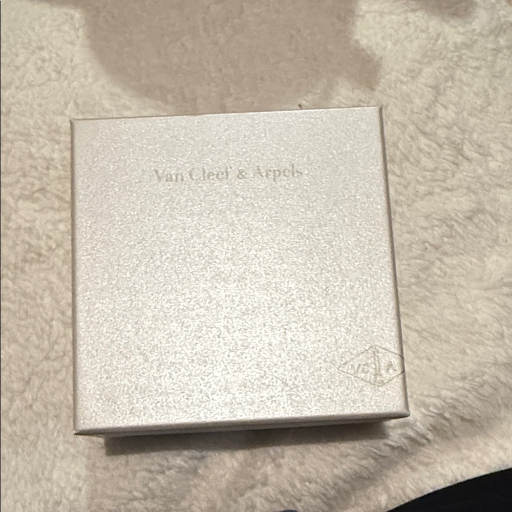 Van Cleef & Arpels Elegant Silver Gift Box